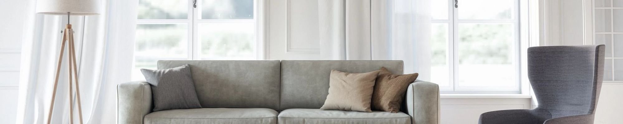 gray sofa and gray area rug from A.T. Frank Floors in Michigan area