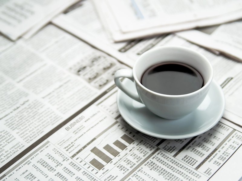 coffee on newspapers - from A.T. Frank Floors Across Michigan